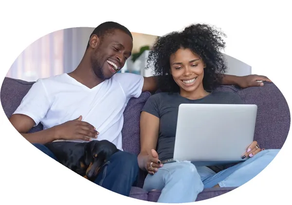 elderly watching a virtual event on a laptop